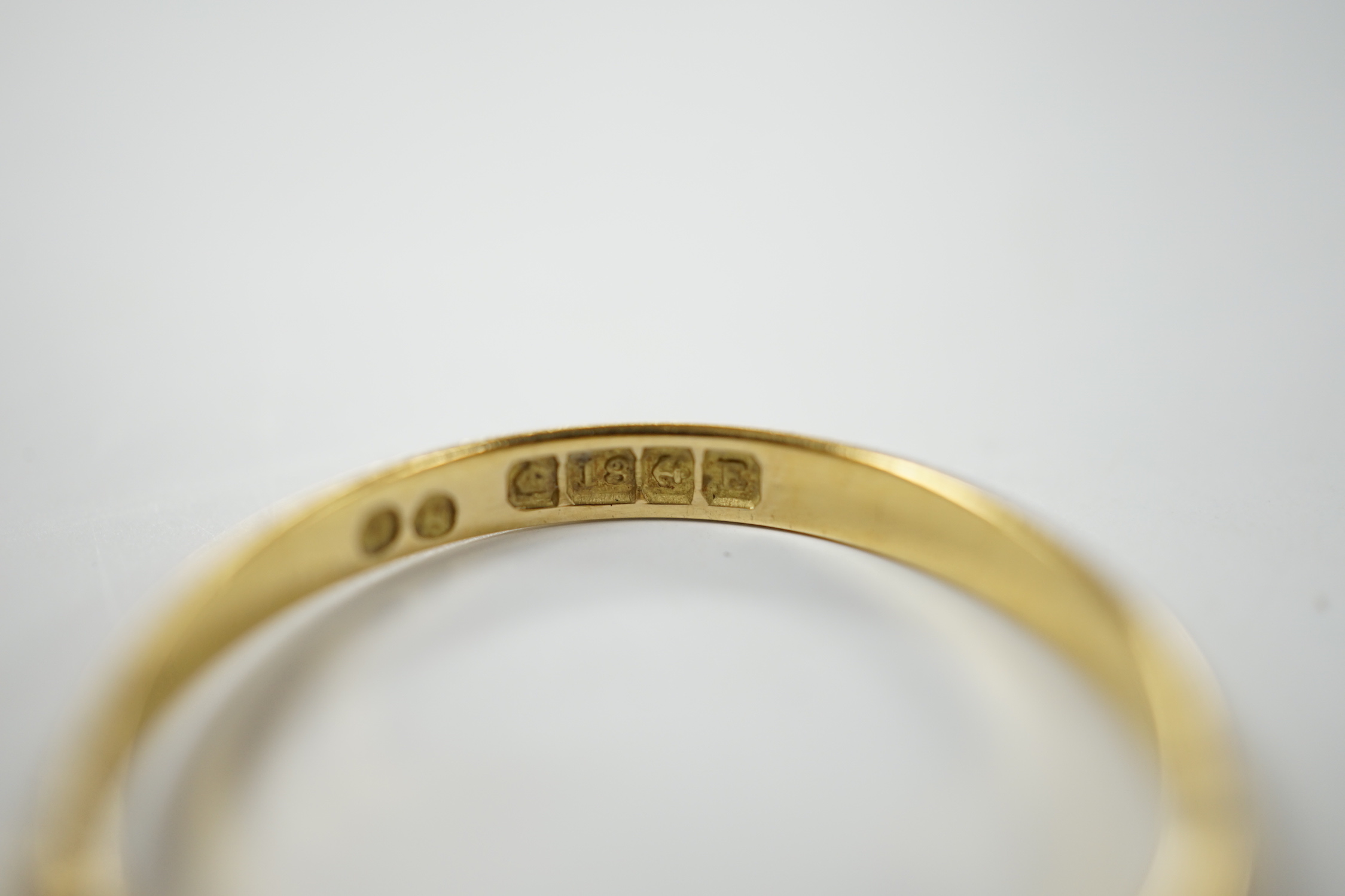 A Victorian 18ct gold and graduated five stone diamond chip set half hoop ring, size X, gross weight 3.6 grams.
